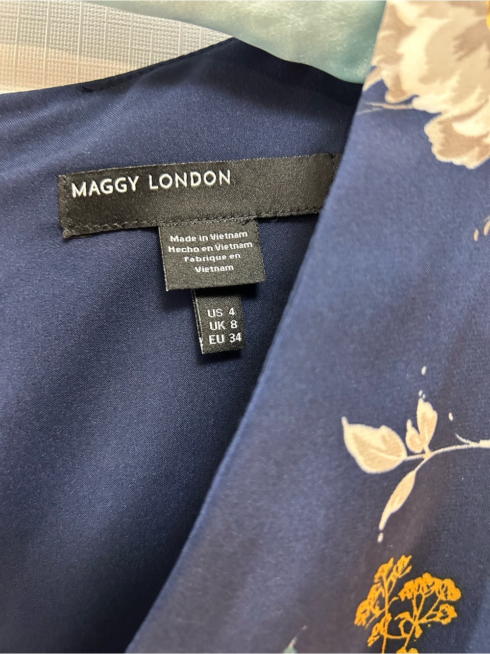 Maggy London Navy Floral Twist-Front Midi Dress with Purple & Cream Blooms - Picture 2 of 8